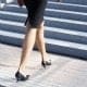 The working mum is wearing a black dress.