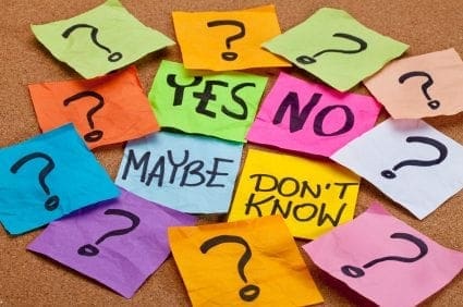 A group of sticky notes with the words yes no maybe don't know, representing the constant juggling act of a working mum trying to maintain work-life balance.