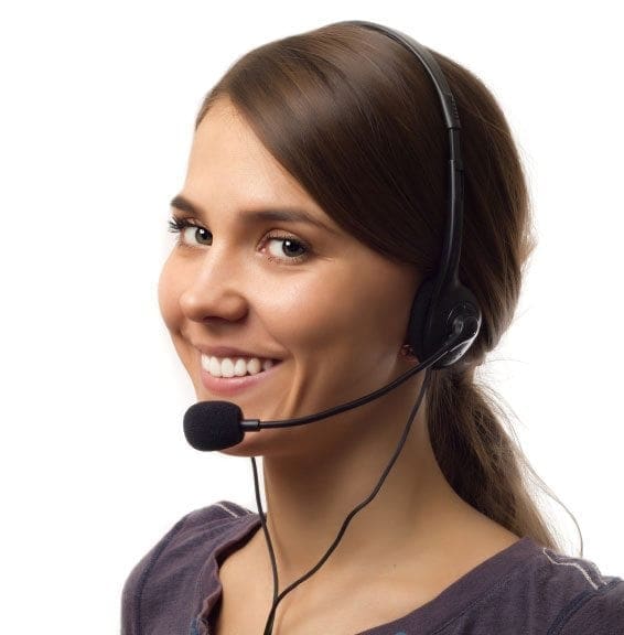 A working mum wearing a headset and smiling, achieving work-life balance.