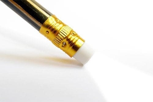 A black and gold pencil on a white surface, representing the importance of work-life balance in one's career.