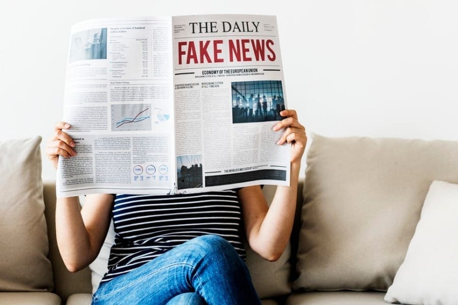 Woman Reading Fake News