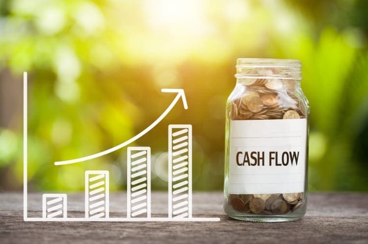 A jar of coins representing cash flow for women returners in their career jobs.
