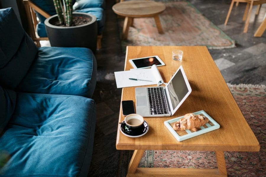A laptop in a coffee shop.
