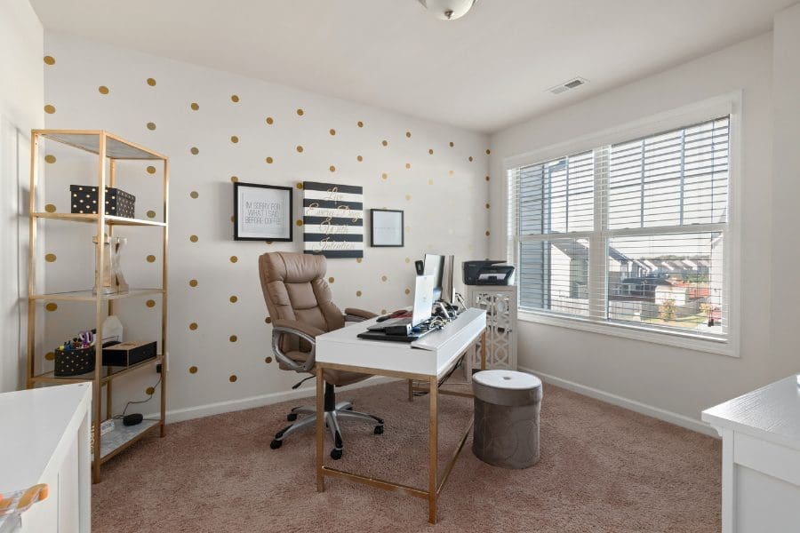 A home office with gold polka dots, perfect for a work-from-home mum.